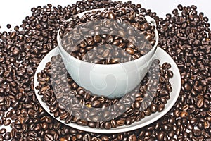 A cup full of coffee beans