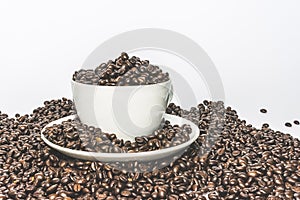 A cup full of coffee beans