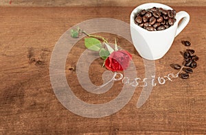 A cup full of coffee beans with red rose.