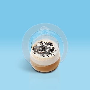 Cup of glace coffee on blue background