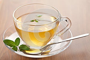 Cup of green tea with mint