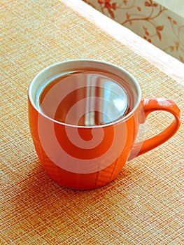 Cup of herbal tea with chamomile flowers. Healthy natural chamomile herbal.Herbal tea on a white wooden background