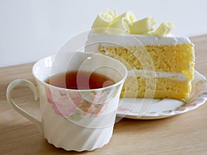 Cup of herbal tea and fresh cake.