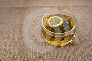 Cup of herbal tea and lemon slice