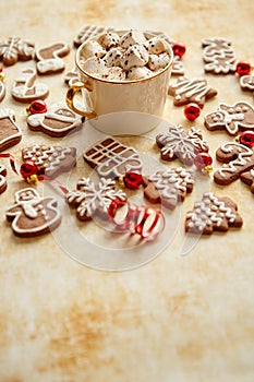 Cup of hot chocolate and Christmas shaped gingerbread cookies