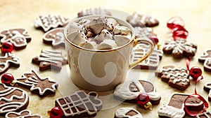 Cup of hot chocolate and Christmas shaped gingerbread cookies