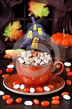 Cup  with  hot chocolate drink and gingerbread cookies  for  Halloween holiday