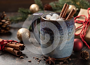 Cup of hot chocolate with holiday background