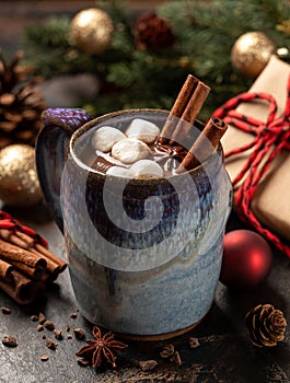 Cup of hot chocolate with holiday background