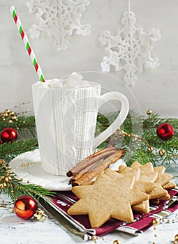 Cup of hot chocolate with marshmallow and Christmas cookies