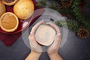 Cup of Hot Chocolate on a Table Set with Various Pies for the Ho