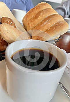 Hot Coffe and bread for eat in the brakfast. photo