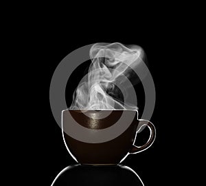 Cup with hot drink, steam over Cup, isolated on black