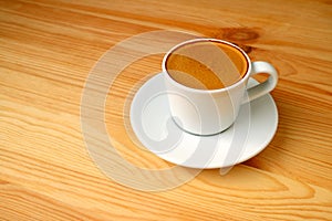 Cup of Hot Espresso Coffee Served on Wooden Table with Free Space for Text and Design