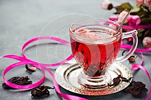 Cup of hot hibiscus tea karkade, red sorrel, rosella