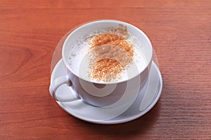 Cup of hot milk with nutmeg