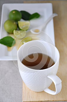 A Cup of Hot Tea with Lime and Honey