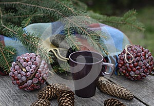 Cup of hot tea on a rustic wooden table.