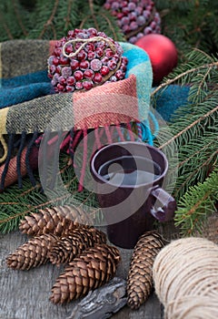 Cup of hot tea on a rustic wooden table.