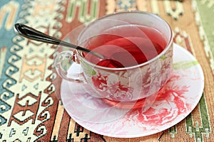 Cup of karkade tea photo