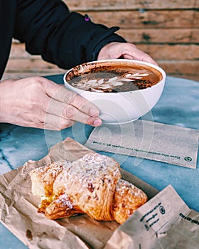 Cup of Latte with Freshly Baked Croissant