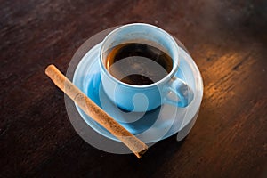 Cup of Luwak coffee with ginger stick sold in Bali, Indonesia