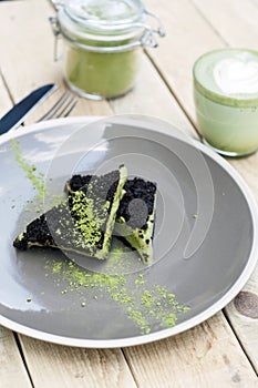 Cup of Matcha Green Tea and Cake and ice cream with matcha