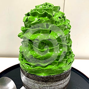 A cup of matcha ice cream