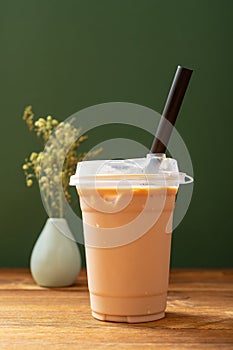 cup of milktea with tapiocas at vertical composition