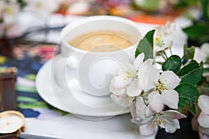 Cup of morning coffee with flowers