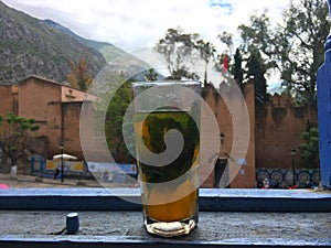 Cup of moroccan Tea in chechaouen the blue city in morocco photo