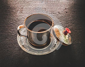 a cup of robusta coffee on the table
