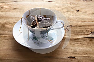 Cup and Saucer with Teabags photo