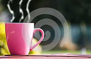Cup with smoking hot drink