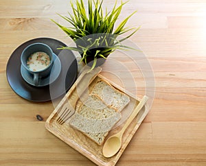 cup soup with bread breakfast on the wood table