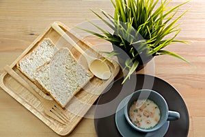 Cup soup with bread breakfast on the wood table