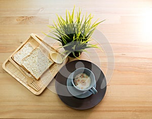 Cup soup with bread breakfast on the wood table