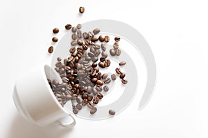 Cup with sparse coffee beans