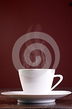 Cup of steaming hot coffee