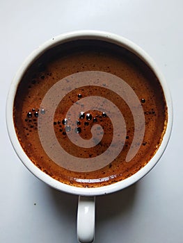 A cup of strong robusta coffee