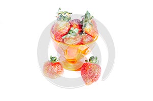 A cup of sweet red fresh strawberry`s of a snack