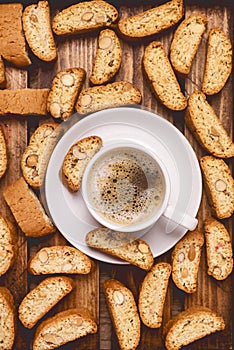 Cup of Tasty Espresso Black Coffee and Italian Almond Biscuit Biscotti on Wooden Background Italian Dessert for Coffee or Wine Top