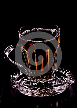 Cup of Tea Against Black Background