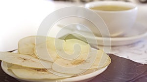 Cup of tea with Baked Dehydrated Apples Chips