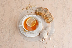 A cup of tea with biscuits