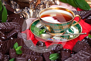 Cup of tea chocolates meeting many chocolate