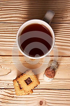 Cup of Tea with Cookies on wooden background