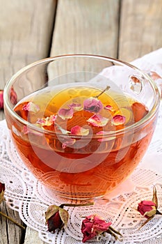 Cup of tea with dried roses