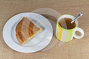 Cup of tea and french king cake