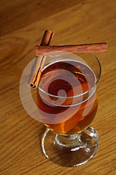 Cup of tea with lemon and cinnamon